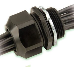 A 2" NPT, 19 Holes, Heyco M3321GBX-SM plastic connector with two wires on it.