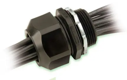A 2" NPT, 19 Holes, Heyco M3321GBX-SM plastic connector with two wires on it.