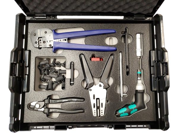 Toolbox containing various hand tools and accessories.