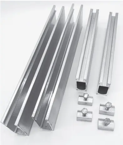 Metal channels and connectors arranged on surface.